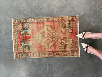 Hand-loomed Vintage Turkish Rug